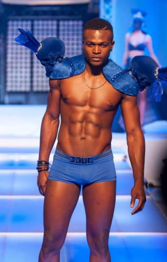 This poor oke. You should've HEARD the meisies scream when he walked down the ramp.