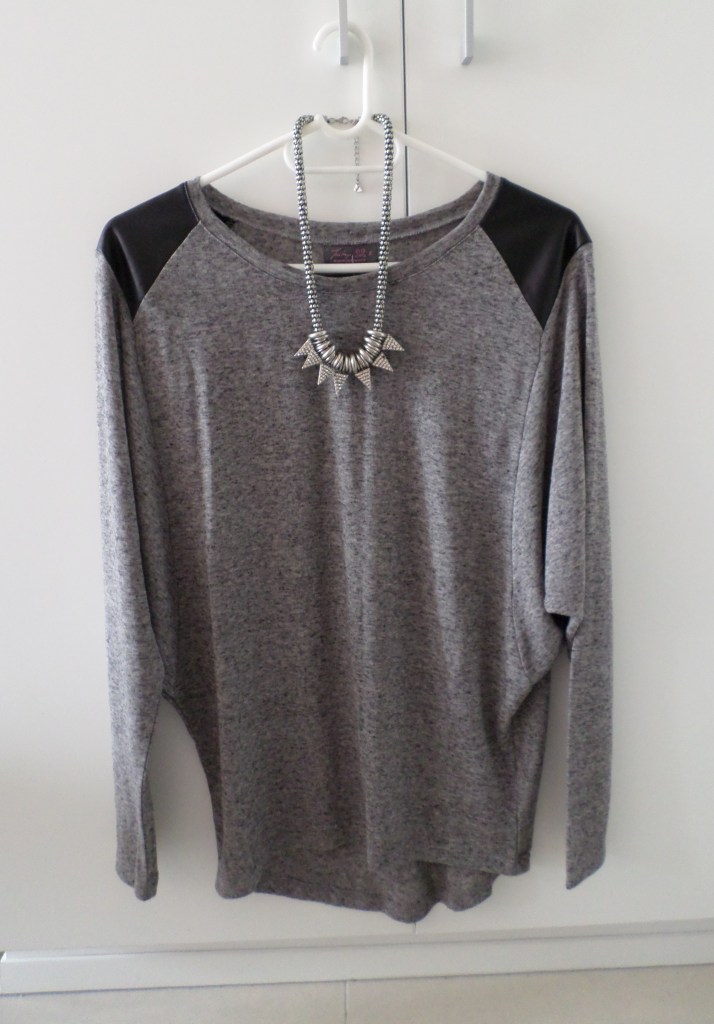 I picked up the necklace ages back from Sass Diva and just stuck it there for styling purposes.