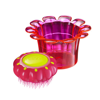 Use the pot to store your hair bands, clips and whatever. The Teezer acts as the 'lid'. Super cute for le kiddies. 