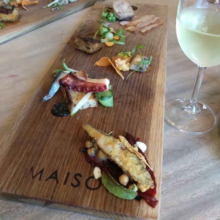 The anchovy is the first one covering the 'N'.