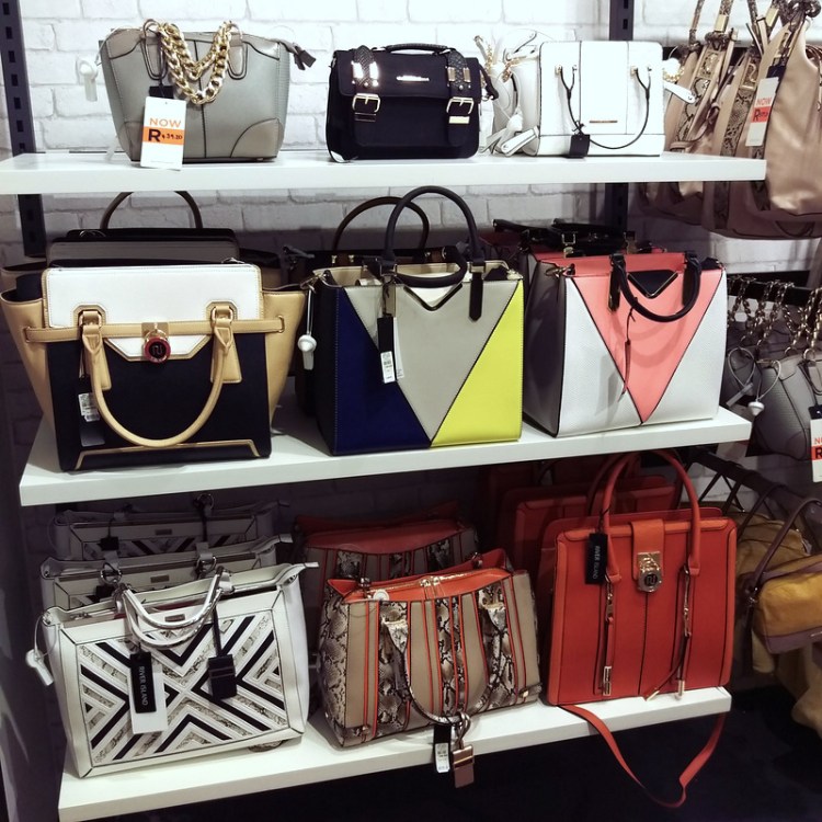 The bag wall at River Island is waiting for you...