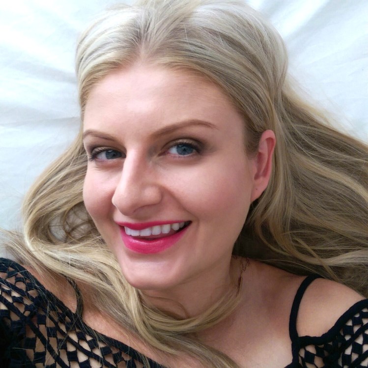 I'm wearing Prevage foundation on my face and Lancome L'Absolu Rouge in BLAH on my lips. Also, you gotta love December. The one month where you're too lazy to sit up for a selfie!