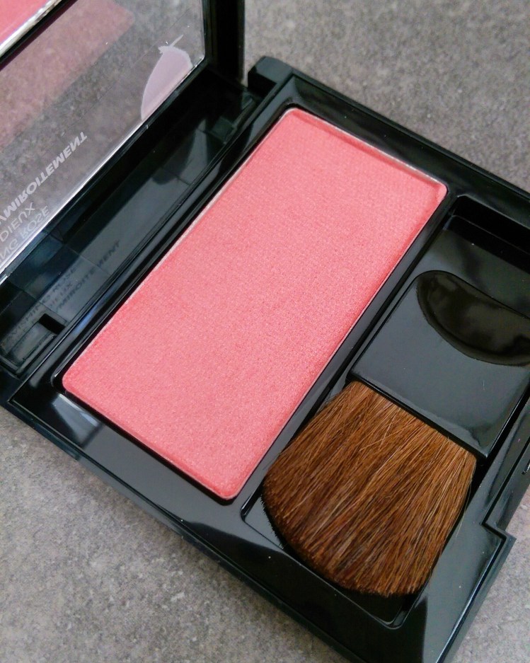 I'd describe this shade as a cross between pink and peach. It reminds me a little of MAC's Springsheen.